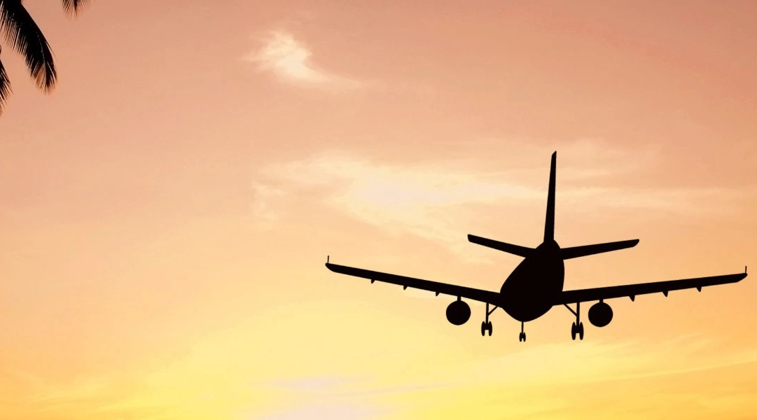 Airplane landing in Malaga with tourists and people on viewing trips in Spain